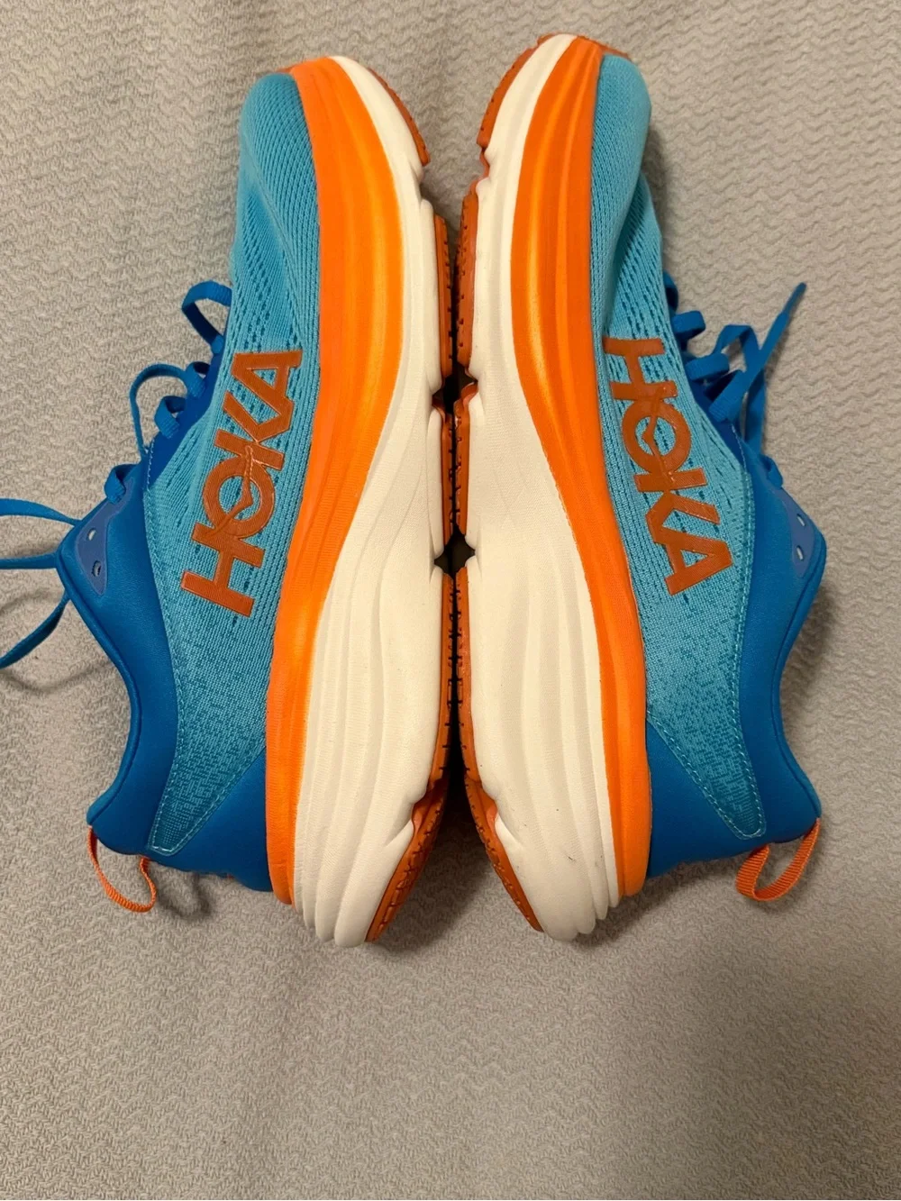 Hoka Men's Blue and Orange Cushioned Running Sneakers size 10